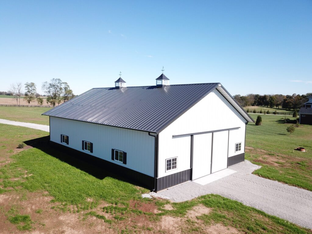 White metal barn or workshop on a rural property